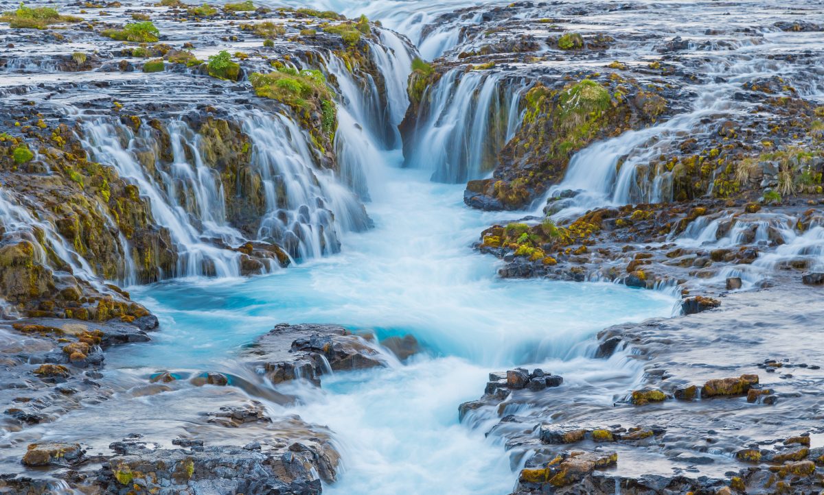 Bruarfoss waterfall shows beautiful blue colors